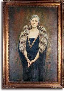 L Gertrude Angell's portrait hangs over the fireplace in the school's library
